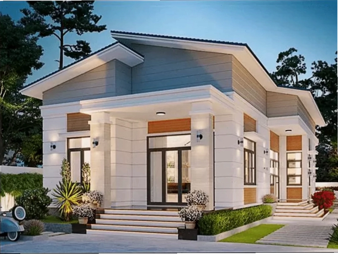 Căn nhà mái lệch có vẻ ngoài gọn gàng với sơn màu sáng và diện tường kẻ chỉ ngang