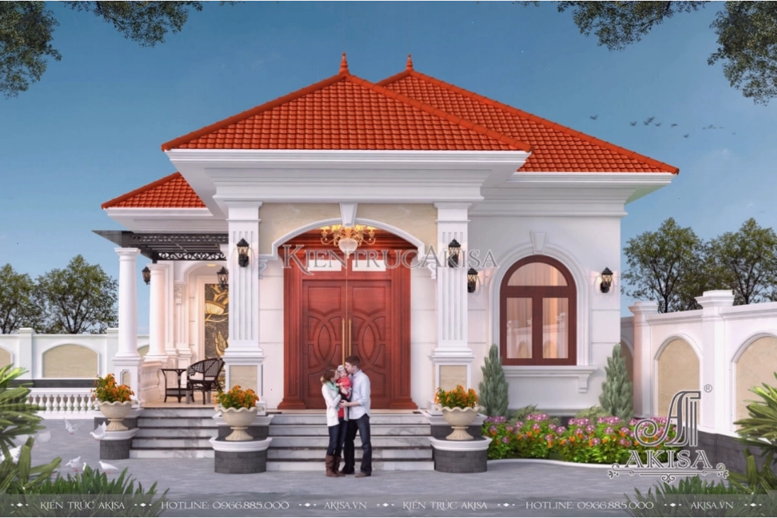 Mặt tiền nhà chữ L mái Nhật với cột hiên vững chãi và bậc tam cấp