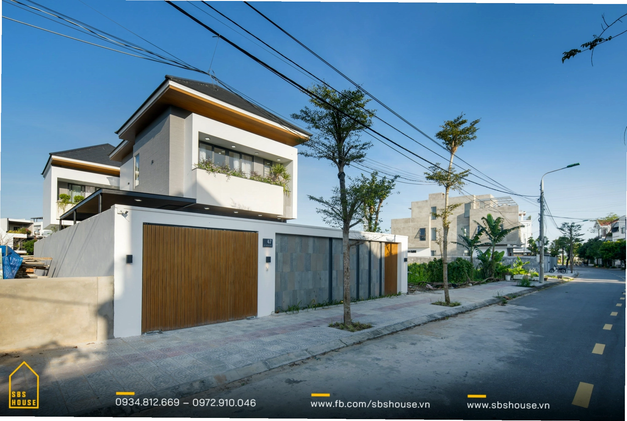 Mẫu cổng conwood đẹp nhà mái Nhật